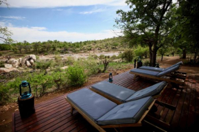 Ivory Wilderness River Rock Lodge